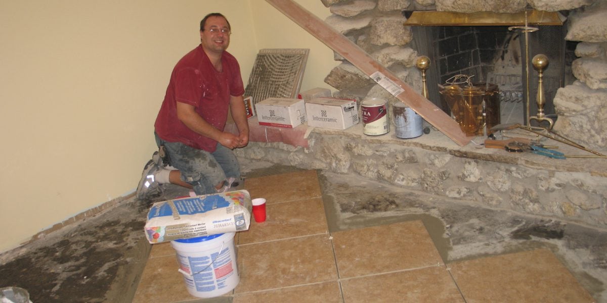 contractor near fireplace